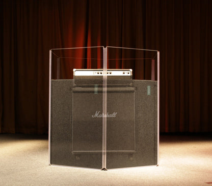 An AmpPac 41 with acrylic shield and sorber absorption baffles isolating a Marshall 4x12 cabinet on a stage.